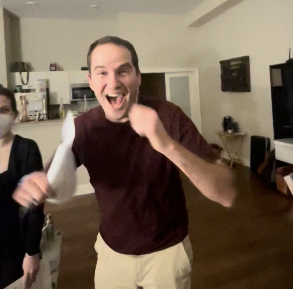 Ensemble member celebrates during a gathering